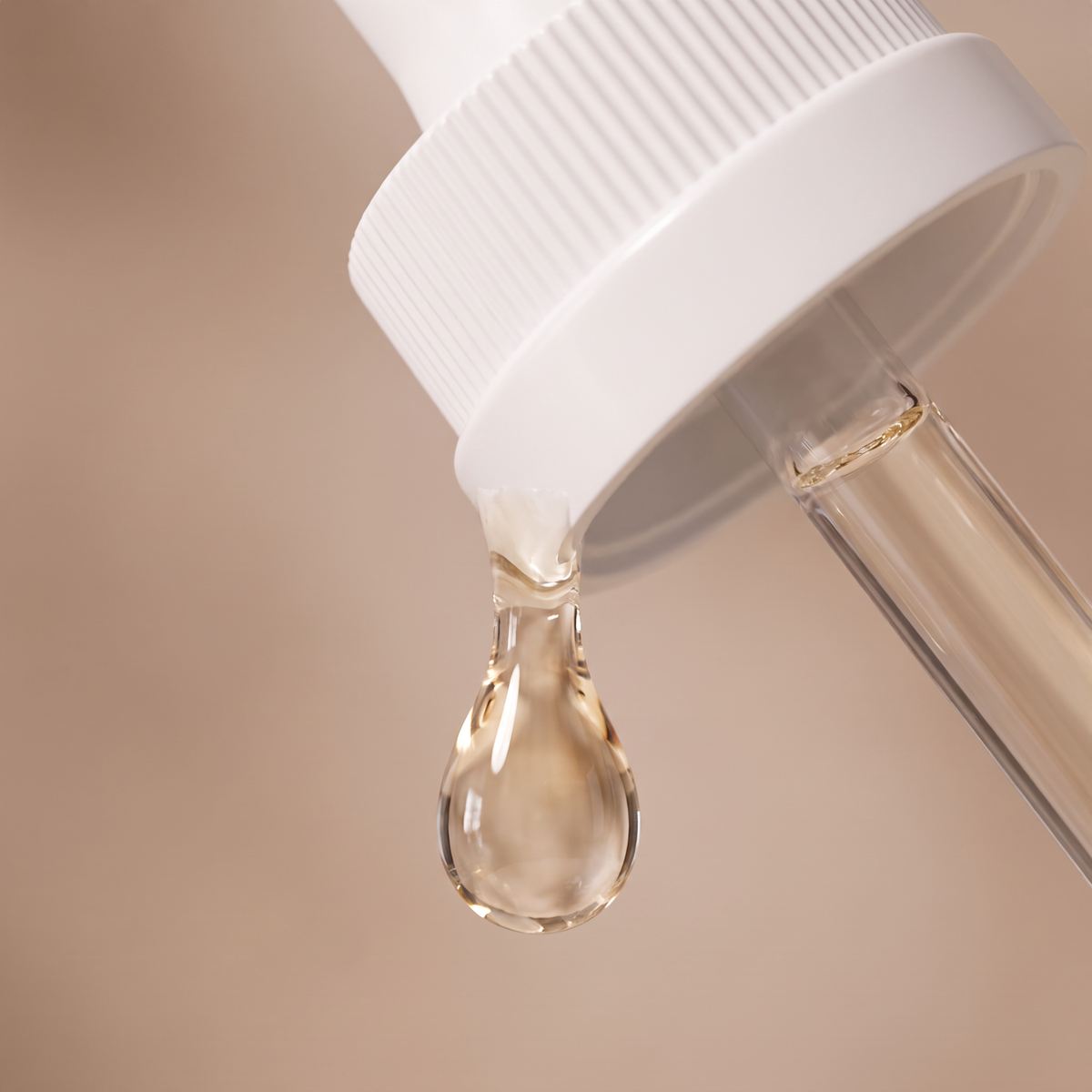 Serum texture — a glistening drop from the dropper